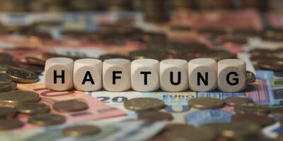 Würfel mit Buchstaben lesen HAFTUNG.